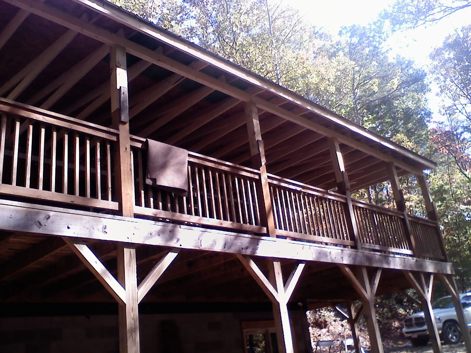 Timber framing under a new elevated porch and deck — Roof Leak Repair in Geneva by Roofing Brothers